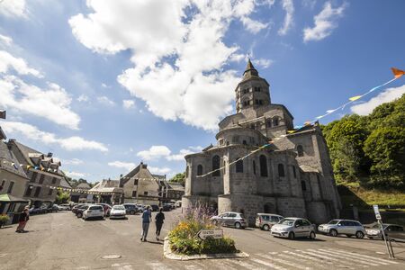 Orcival, France. The Basilique Notre-Dame (Our Lady Basilica), a Roman catholic Romanesque church in Auvergneのeditorial素材