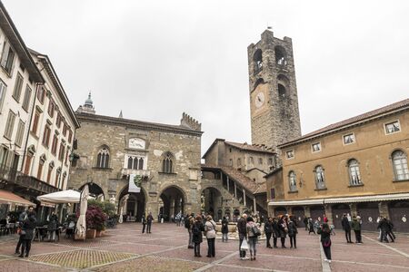 Bergamo, Italy. Monuments of the Citta Alta (upper city): the Palazzo della Ragione, the Contarini Fountain and the Torre Civicaのeditorial素材