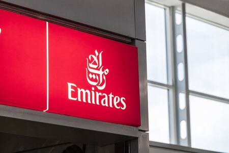 Athens, Greece. Logo of Emirates, an airline based in Dubai, United Arab Emirates, at Athens International Airportのeditorial素材