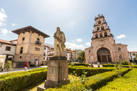 Cangas de Onis, Spain. The Iglesia de Santa Maria (St Mary's Church), with the monument to Don...
