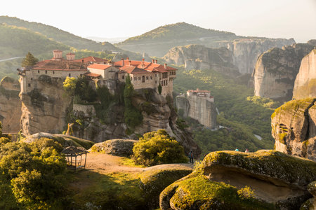 Meteora, Greece. Sunrise at the Byzantine Monasteries of Varlaam and Roussanou in the rocks at...