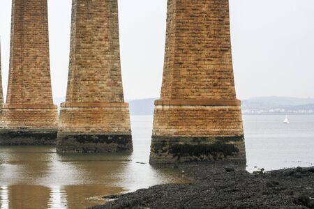 Edinburgh, Scotland. Painting, maintenance and repair works in the Forth Rail Bridge, as seen from South Queensferryの写真素材