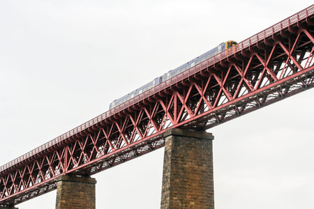 Edinburgh, Scotland.  maintenance and repair works in the Forth Rail Bridge, as seen from South Queensferryの写真素材