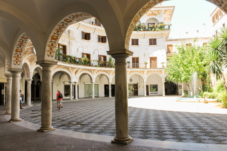 Sevilla, Spain. The Plaza del Cabildo, a walled and semicircular square in the Old Town of Seville