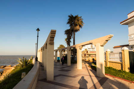 Chipiona, Spain. The promenade or quay close to the lighthouse in this town in Andaluciaのeditorial素材