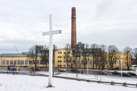 Tallinn, Estonia. The Energia avastuskeskus (Energy Discovery Center), with a white wooden cross and a smokestackのeditorial素材