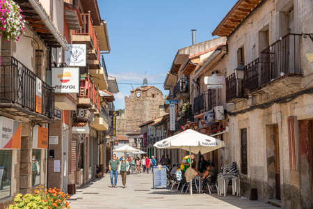 Buitrago del Lozoya, Spain. The Torre Albarrana, a city gate and defensive clock tower of the walled Old Town, seen from Calle Realのeditorial素材