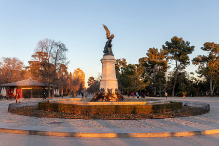 Madrid, Spain. The Fuente del Angel Caido (Monument of the Fallen Angel), a fountain located in the Buen Retiro Parkのeditorial素材