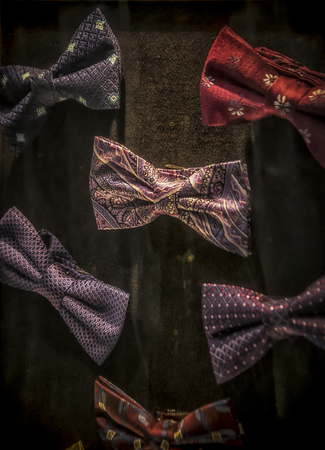 A display of colorful bow tiesの写真素材