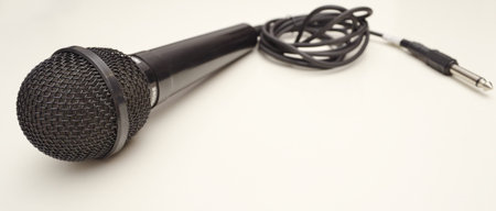 black microphone on white backgroundの写真素材