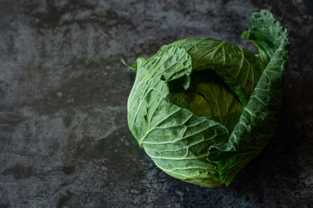 Close up Fresh Cabbage on black background. Top viewの写真素材