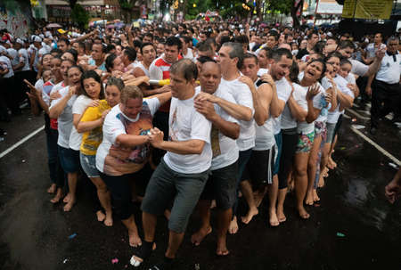 Pilgrims paying their promises to Our Lady of Nazareth at CÃ­rio de NazarÃ©, the largest Marian procession of the world, which happens every October in BelÃ©m, ParÃ¡, Amazon, Brazil. October, 2017.のeditorial素材