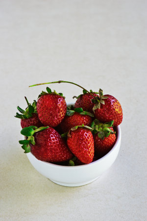 Strawberries in a white bowlの写真素材
