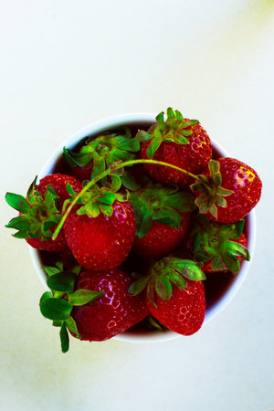 Strawberries in a bowlの写真素材