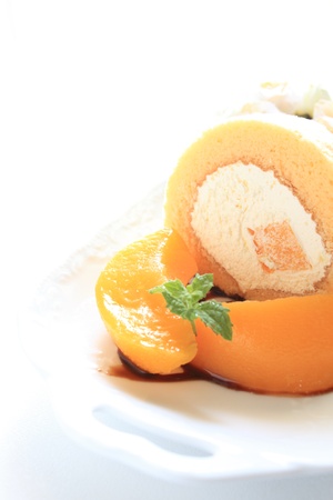 Home bakery Swiss Roll with freshness peachの写真素材