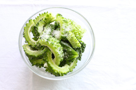 salt on bitter melon for cooking imageの写真素材