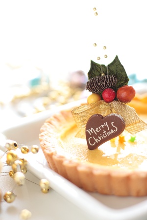 christmas cheese cake with ornamentの写真素材