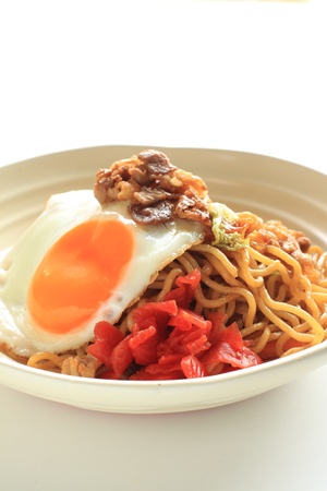 Japanese cuisine, fried noodles with sunny side up eggの写真素材