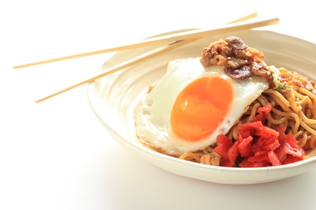 Japanese cuisine, fried noodles with sunny side up eggの写真素材