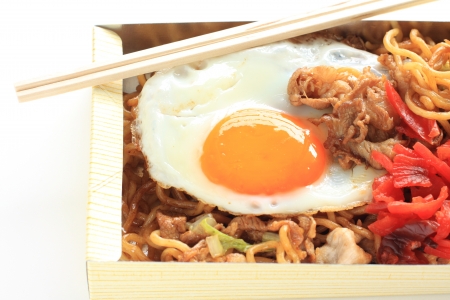 Japanese cuisine, fried noodles with sunny side up eggの写真素材