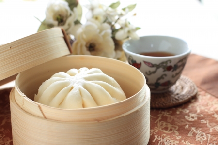 chinese Dimsum, steamed bun in bamboo steamerの写真素材
