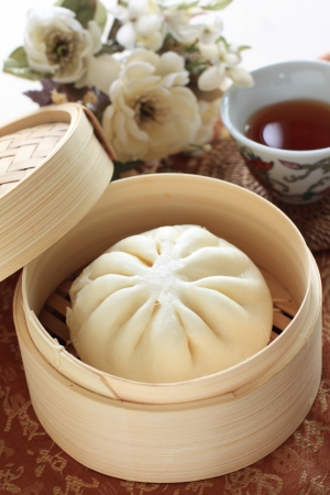 chinese Dimsum, steamed bun in bamboo steamerの写真素材