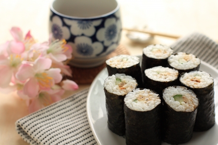 Japanese cuisine, Natto sushi roll with tea and flowerの写真素材