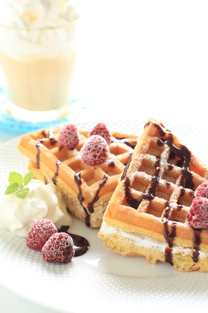 iced coffee latte with american waffleの写真素材