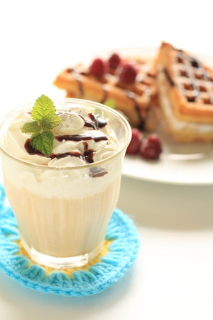 iced coffee latte with american waffleの写真素材