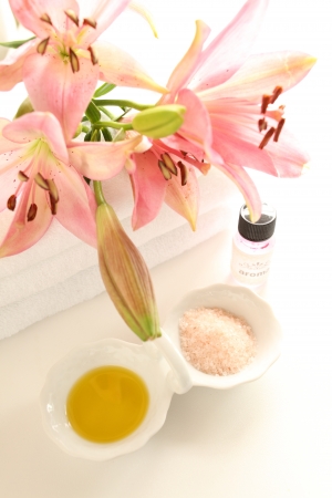 elegant lily and spa oil with salt for message imageの写真素材