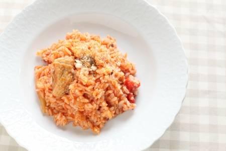 italian cuisine, chicken and tomato risottoの写真素材