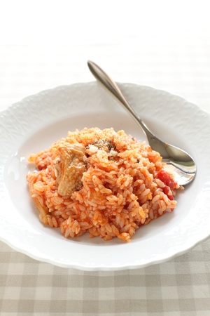 italian cuisine, chicken and tomato risottoの写真素材