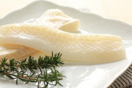 Freshness raw flatfish and rosemaryの写真素材