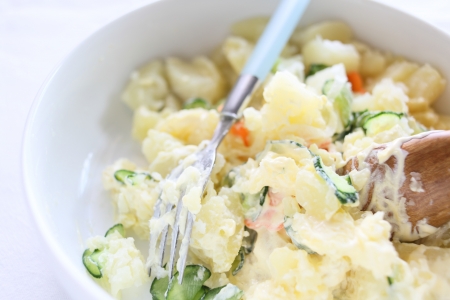 cooking of potato and cucumber saladの写真素材