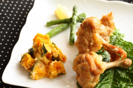 deep fried chicken leg and pumpkin salad for buffet food imageの写真素材