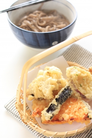 Japanese cuisine, shrimp and vegetable tempura with soba noodles on backgroundの写真素材