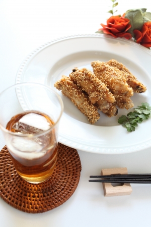 Chinese food, sesame fried chicken and drinkの写真素材