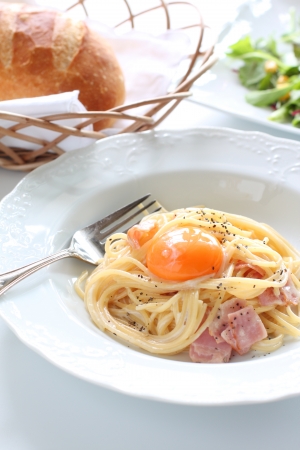 italian food, Spaghetti Carbonara with bread and salad の写真素材