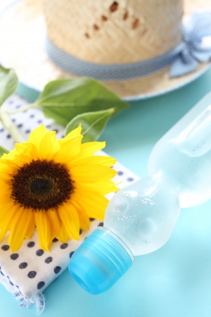Sunflower and soda drink summer imageの写真素材