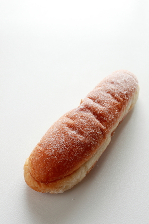 Japanese school food, deep fried bread with sugar on topの写真素材