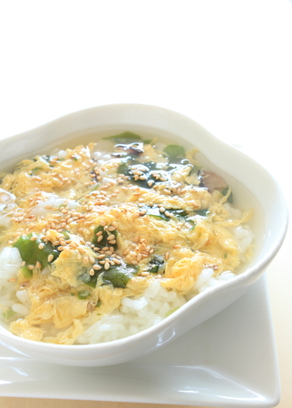 Asian food, egg and seaweed soup riceの写真素材