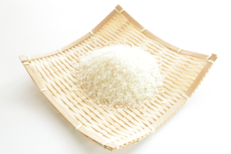 Japanese Pearl rice on bamboo basketの写真素材
