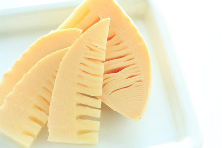 sliced bamboo shoot on white dish