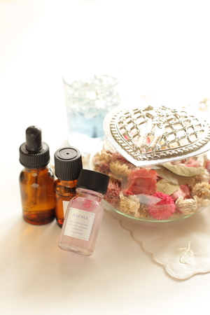 Potpourri fragrant plant material and aroma oilの写真素材