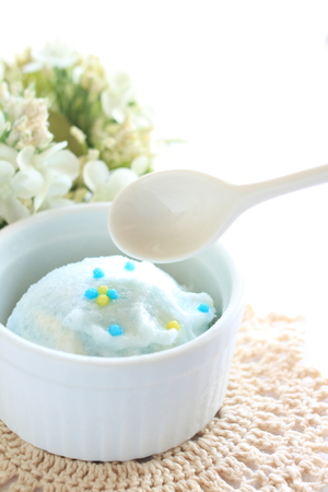 close up of blue soda ice cream with candyの写真素材