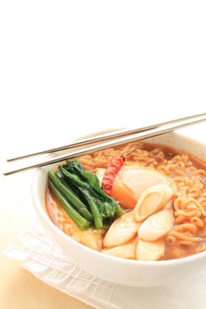 Korean food, egg and spinach on ramen noodleの写真素材