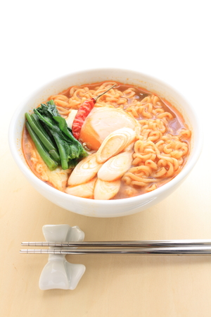 Korean food, egg and spinach on ramen noodleの写真素材