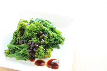 Chinese food boiled Choi sum Nanohana with Oyster sauceの写真素材