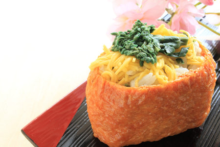 Japanese food Nanohana on inarisushiの写真素材