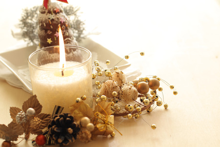 Christmas candle and cakeの写真素材